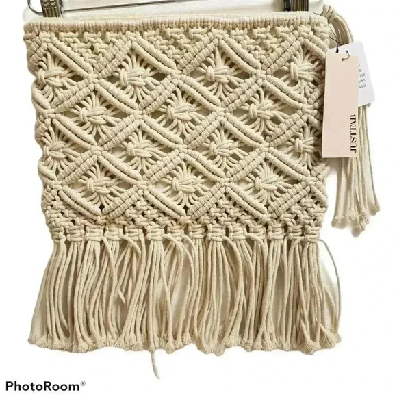 JustFab Handbags - Just Fab cream color macrame clutch New with tags
